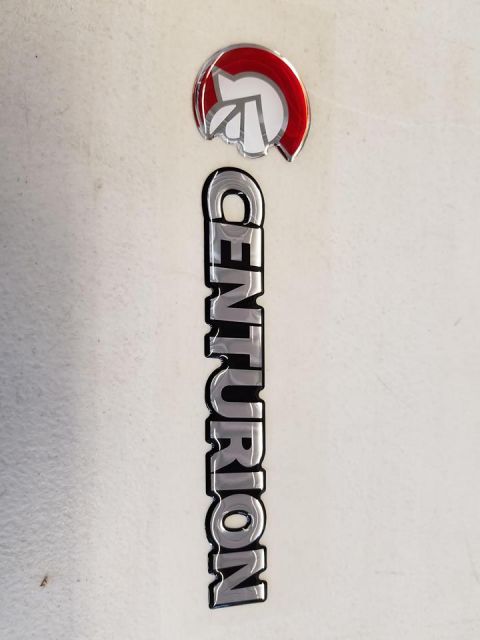 New Old Stock (NOS) Centurion Conversion Badges