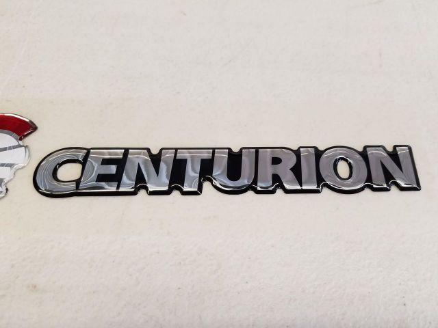 New Old Stock (NOS) Centurion Conversion Badges